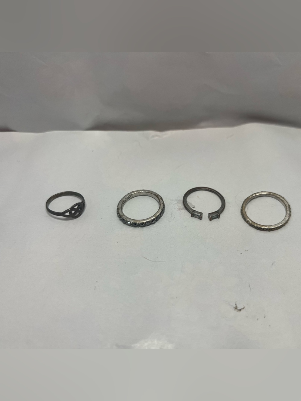 One silver and three Mixed Silver-Tone Ring Set stackable one from Scotland